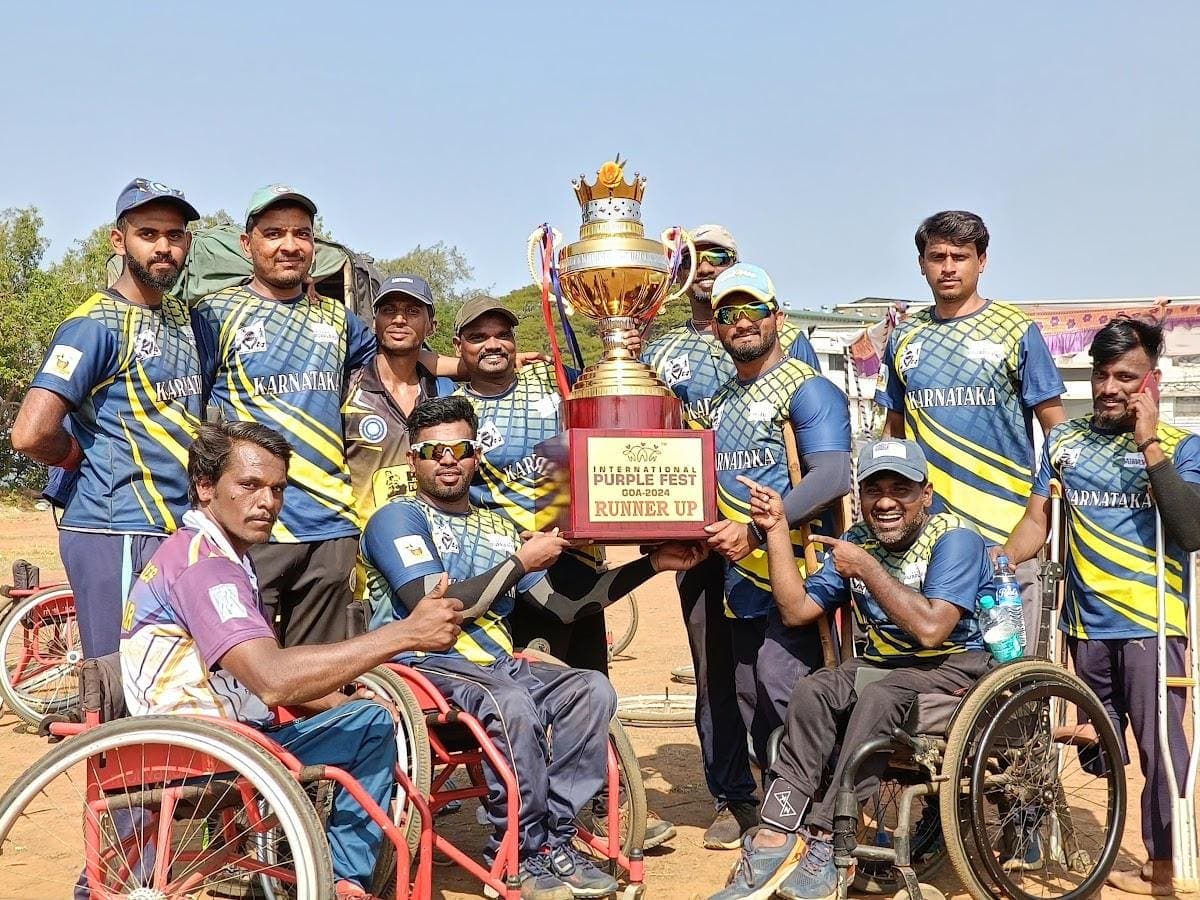 Ajit Padasalagi's team posing around a trophy
