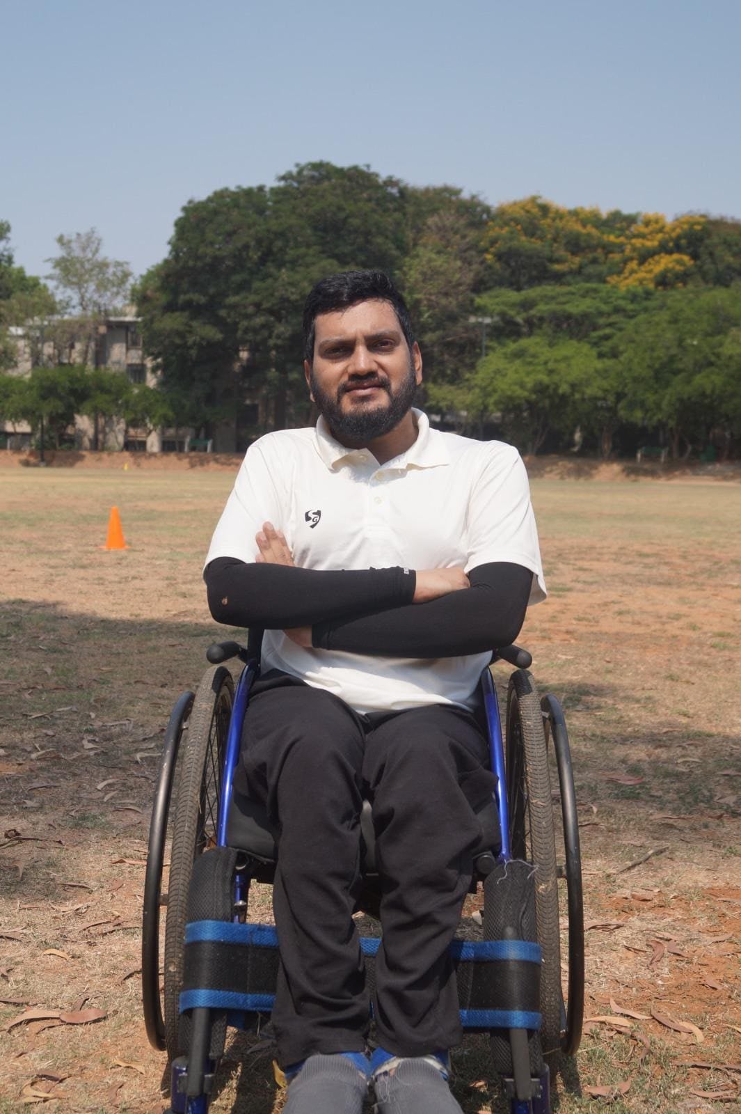 Mohammed Umar Manna seated in a sports wheelchair at the ground