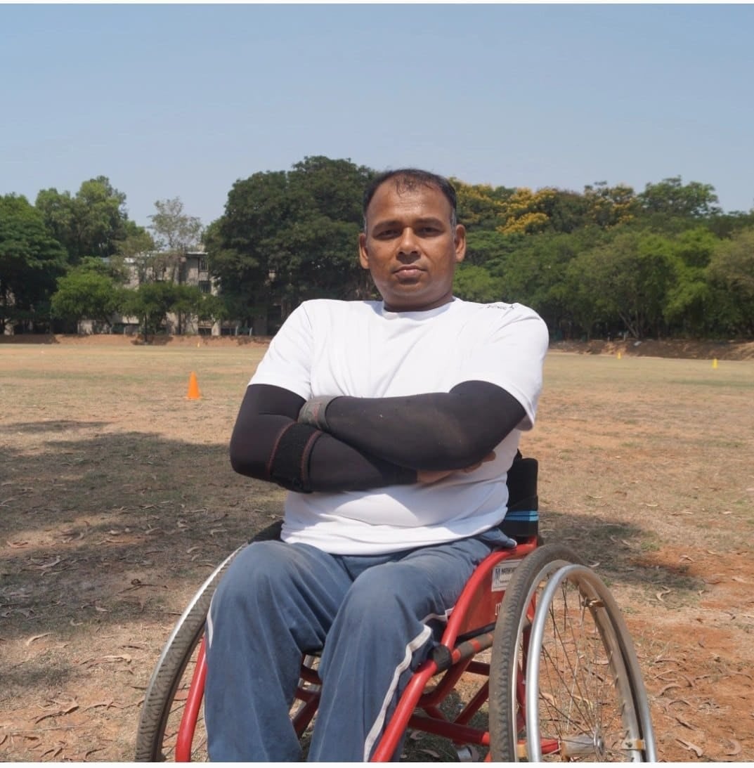 Portrait of Rakesh Kumar Singh seated in a sports wheelchair at the ground